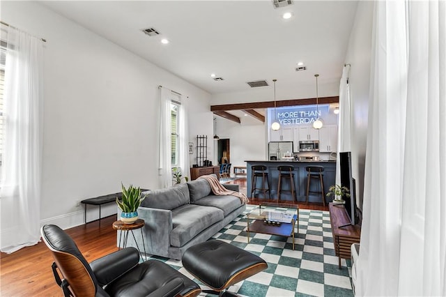 living room with hardwood / wood-style flooring