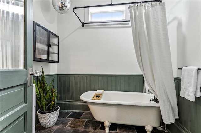 bathroom featuring a tub to relax in