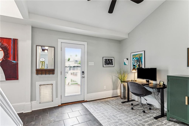 tiled office featuring ceiling fan and vaulted ceiling