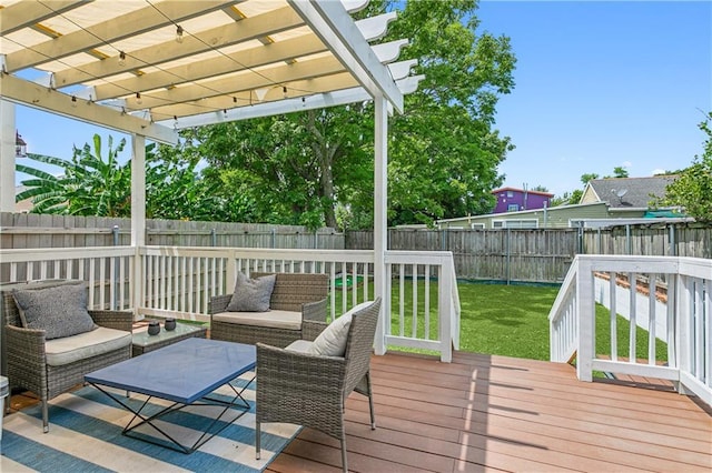 wooden terrace featuring outdoor lounge area and a lawn