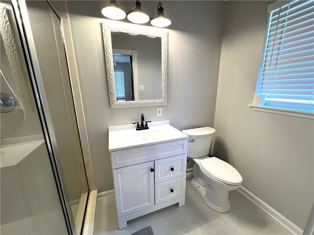 248 Willow Dr, Gretna, LA 70053 - full bath featuring baseboards, a shower stall, vanity, and toilet