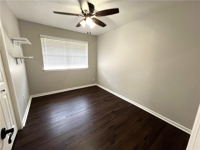 spare room featuring ceiling fan and hardwood / wood-style floors