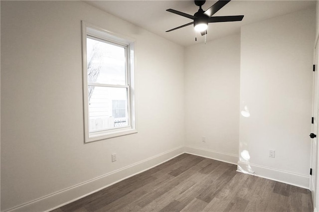 unfurnished room with ceiling fan and hardwood / wood-style floors