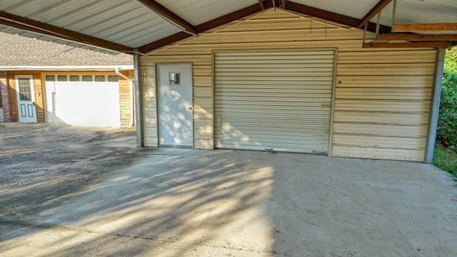 garage with a carport