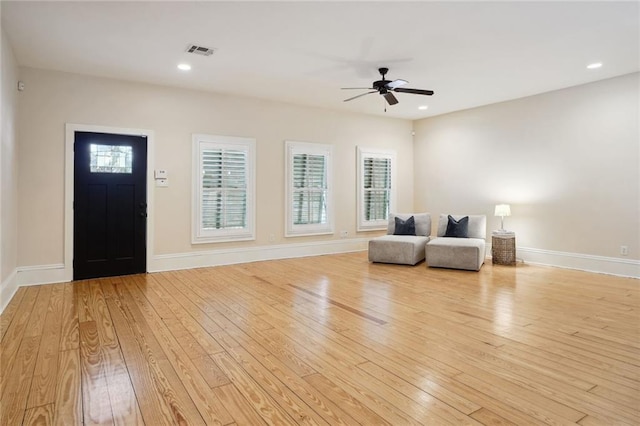 entrance foyer featuring ceiling fan and light hardwood / wood-style flooring