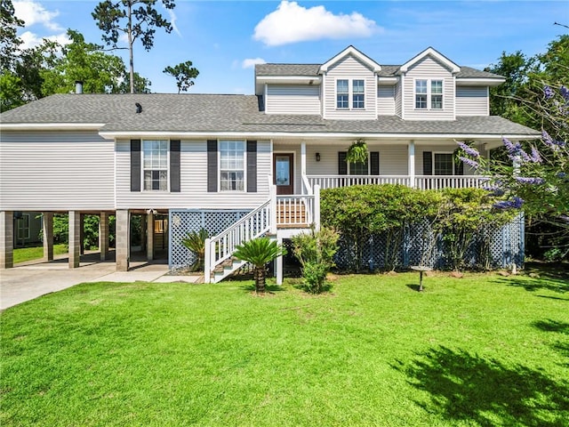 view of front facade featuring a carport, a front yard, and a porch