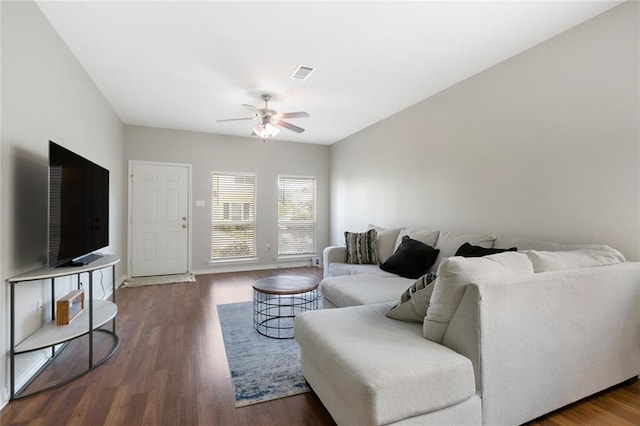 living room with ceiling fan and hardwood / wood-style floors