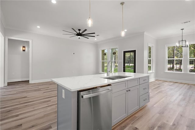 kitchen with sink, dishwasher, ceiling fan with notable chandelier, and light wood-type flooring