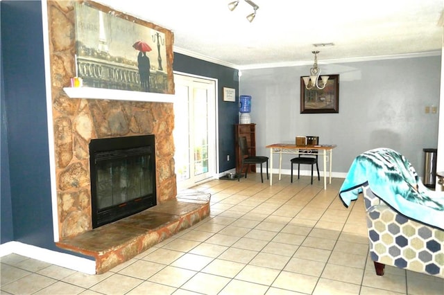 interior space with ornamental molding, an inviting chandelier, and a stone fireplace