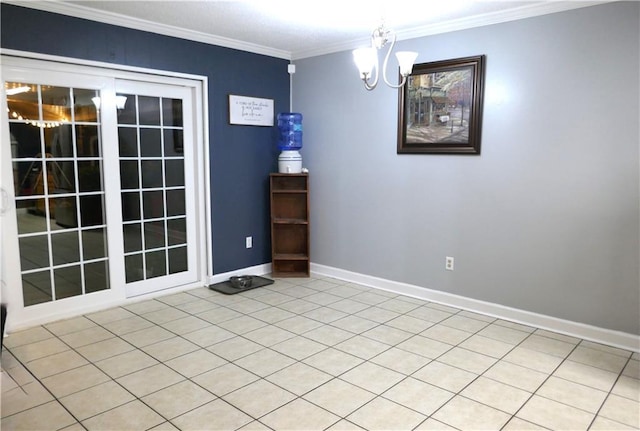 empty room featuring an inviting chandelier, baseboards, and crown molding