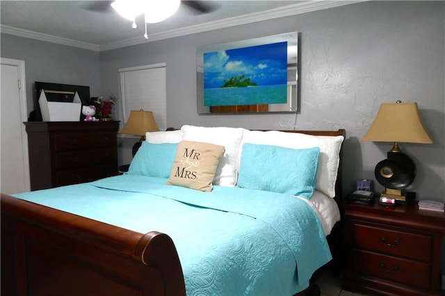 bedroom featuring ornamental molding and a ceiling fan