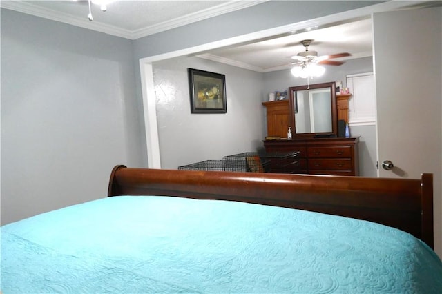 bedroom with ornamental molding and a ceiling fan