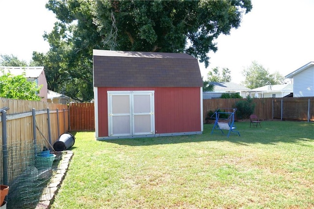 view of shed featuring a fenced backyard