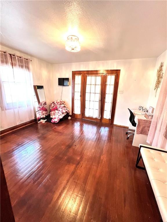 foyer entrance featuring dark hardwood / wood-style floors