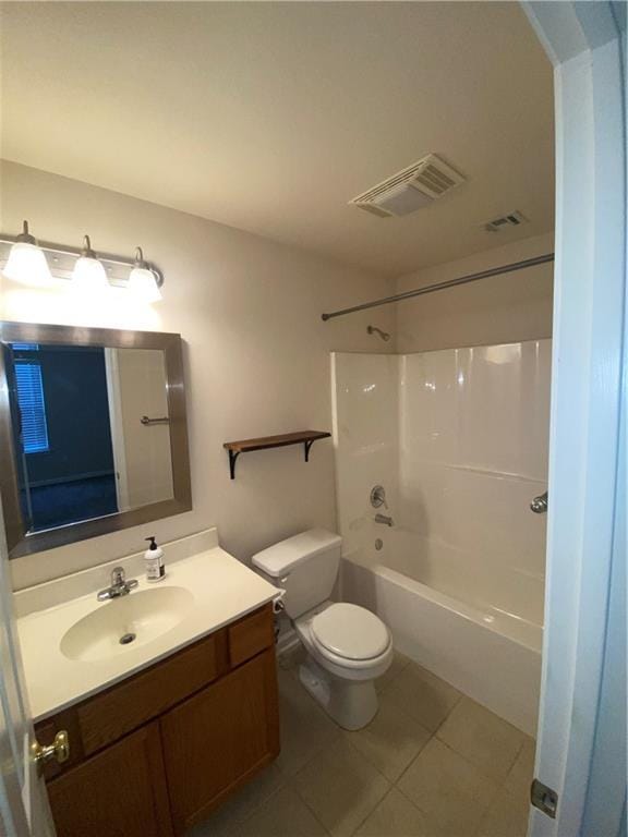 full bathroom with visible vents, toilet, tile patterned floors, vanity, and shower / bathing tub combination