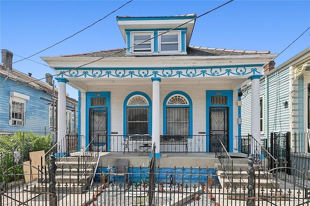 view of front of property featuring covered porch