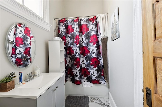 bathroom with tile patterned floors and vanity