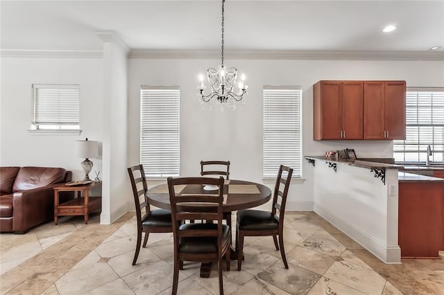 dining space featuring a notable chandelier, light tile patterned floors, and crown molding