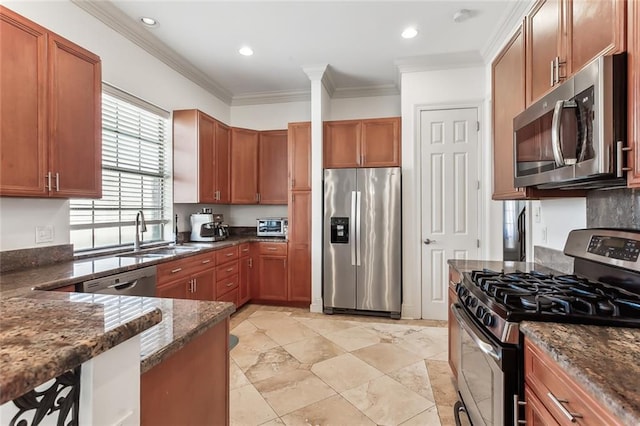 kitchen featuring light tile patterned flooring, dark stone counters, sink, ornamental molding, and stainless steel appliances