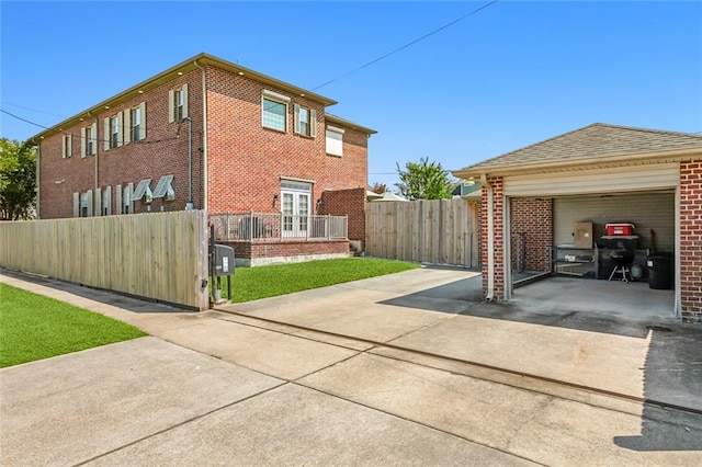 view of side of property featuring a garage