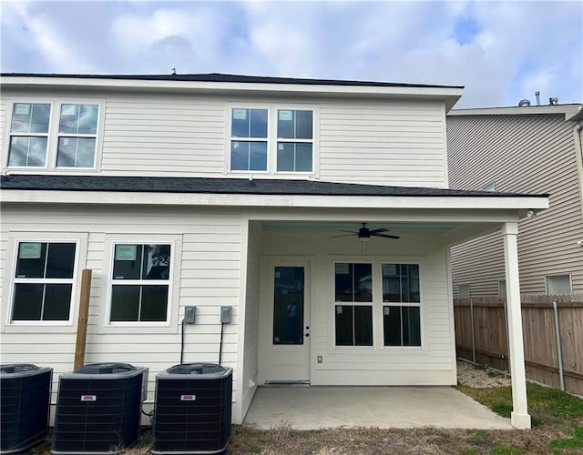 rear view of house featuring central AC, ceiling fan, and a patio area