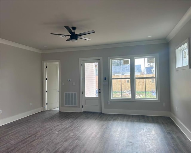 interior space featuring crown molding, ceiling fan, and dark wood-type flooring