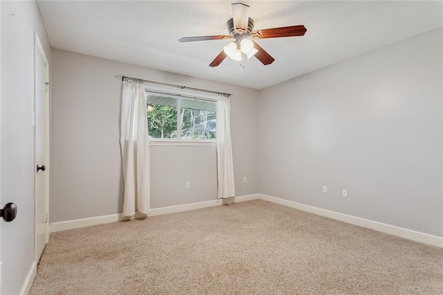 spare room with ceiling fan