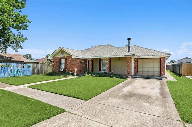 ranch-style house with a garage and a front lawn