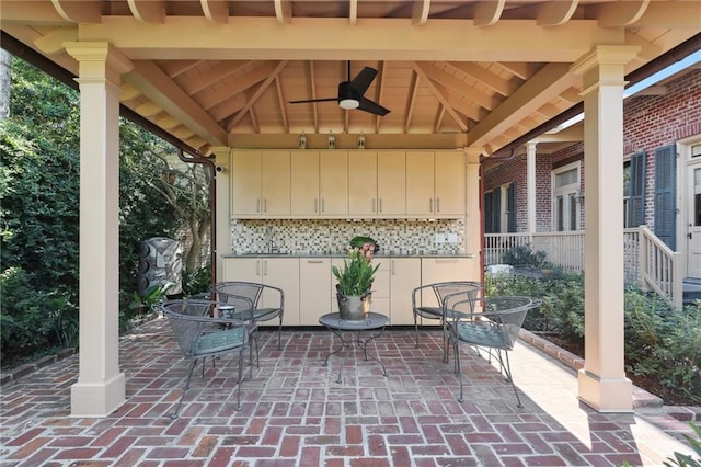 view of patio with ceiling fan