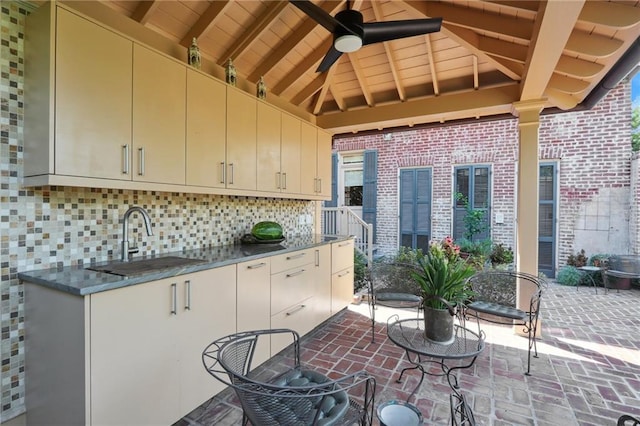 view of patio featuring sink and ceiling fan