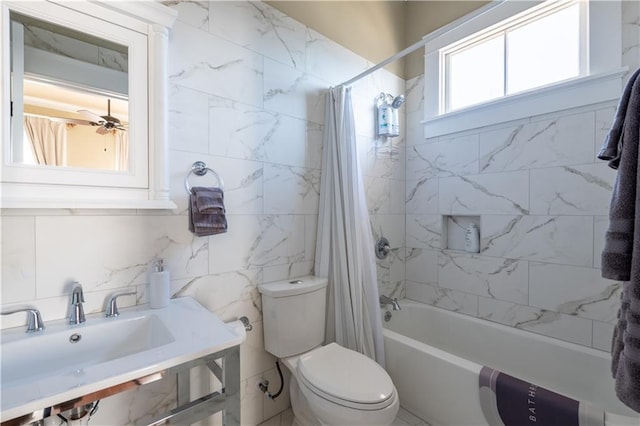 full bathroom with shower / tub combo, toilet, tile walls, and sink