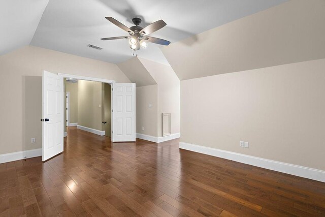 additional living space featuring ceiling fan, dark hardwood / wood-style floors, and lofted ceiling