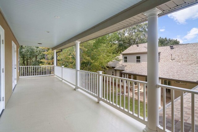 view of patio featuring a balcony