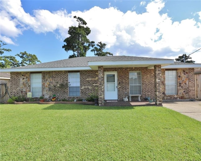 ranch-style house with a front yard