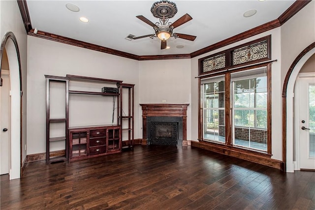 unfurnished living room with ornamental molding, dark hardwood / wood-style flooring, and ceiling fan