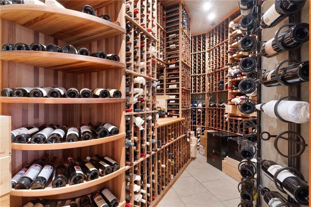 wine area with light tile patterned floors