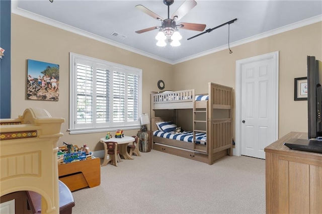 bedroom featuring light carpet, crown molding, visible vents, and ceiling fan