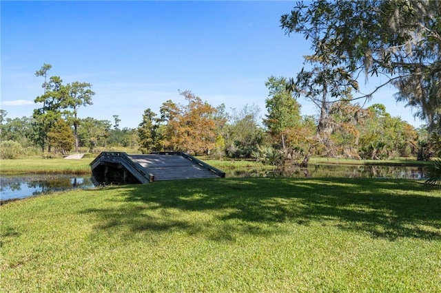 view of yard with a water view