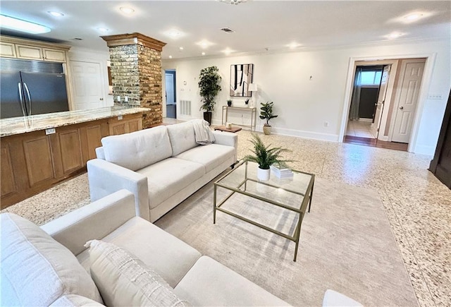 living room with crown molding