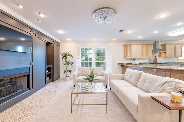 carpeted living room featuring ornamental molding