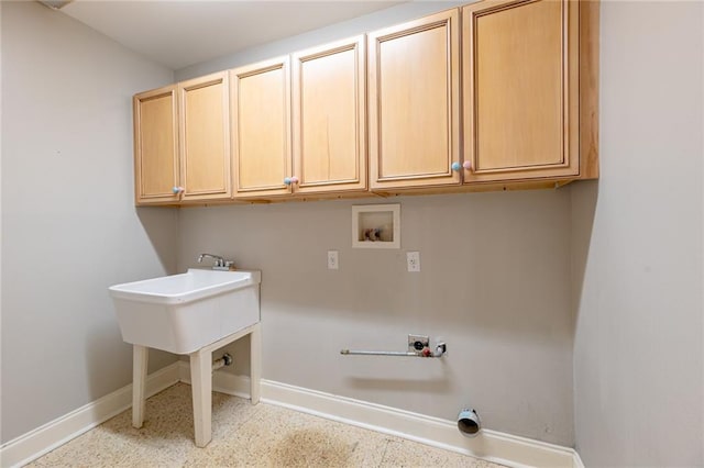 clothes washing area with washer hookup, gas dryer hookup, hookup for an electric dryer, and cabinets