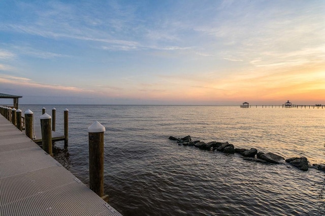 dock area featuring a water view