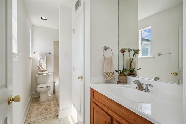 full bathroom with tile patterned floors, toilet, independent shower and bath, and vanity