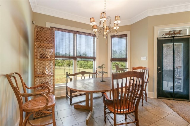 tiled dining space featuring ornamental molding and a chandelier