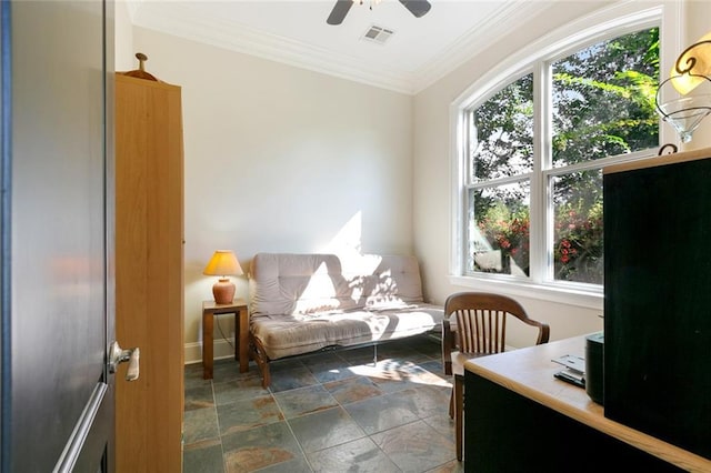 sitting room with ornamental molding and ceiling fan