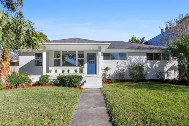 view of front of home with a front yard