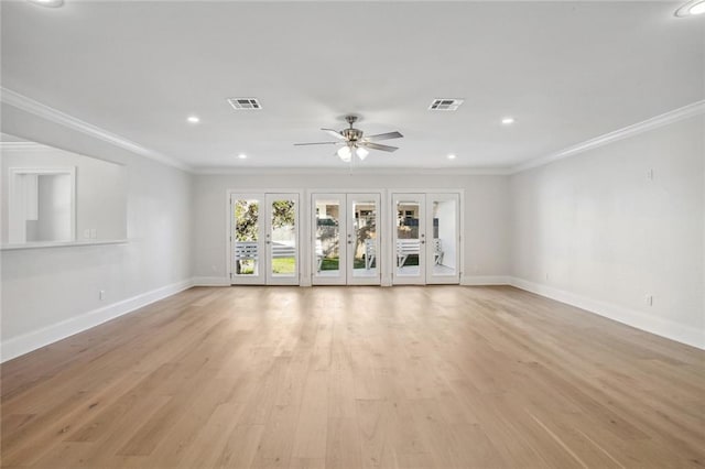 unfurnished room featuring light wood-type flooring, french doors, ornamental molding, and ceiling fan