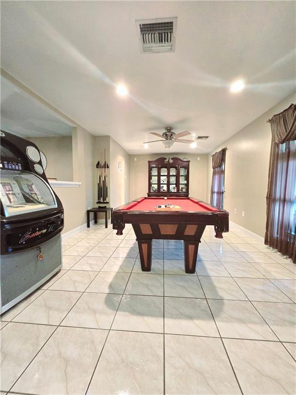 playroom featuring ceiling fan, billiards, and light tile patterned floors