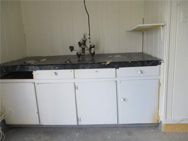 interior space featuring white cabinets