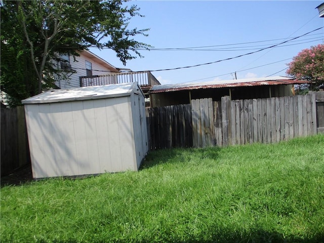 view of outdoor structure featuring a lawn